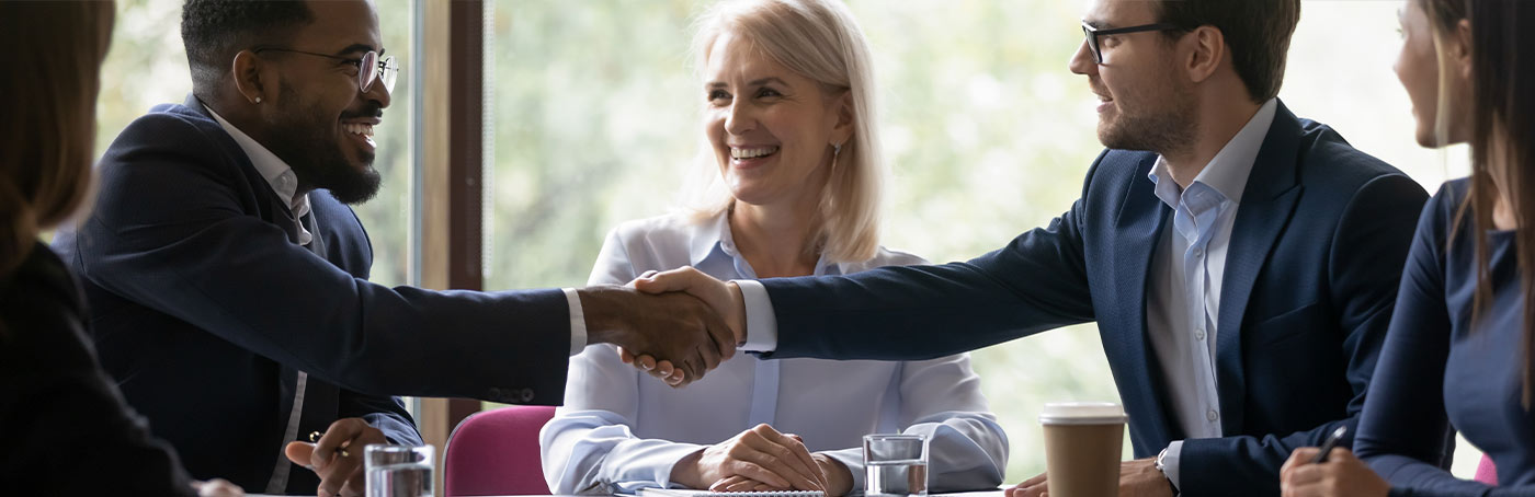 group of professionals shaking hands